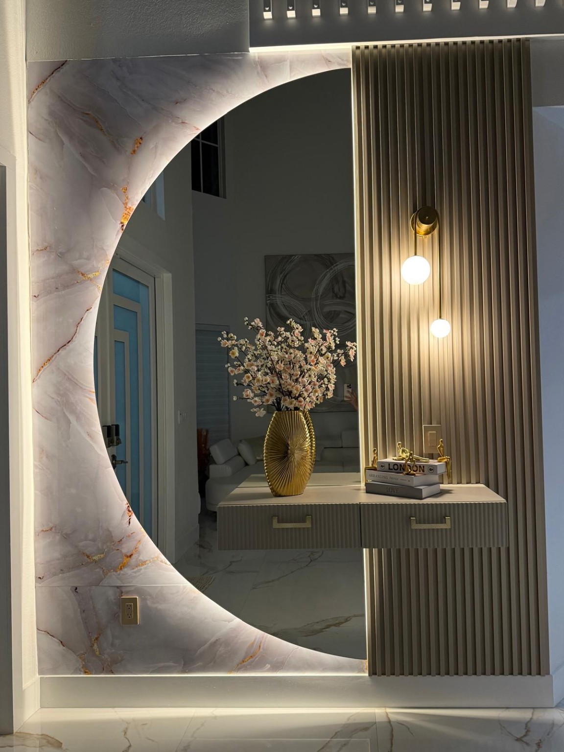 Custom mirror and wall panel feature
