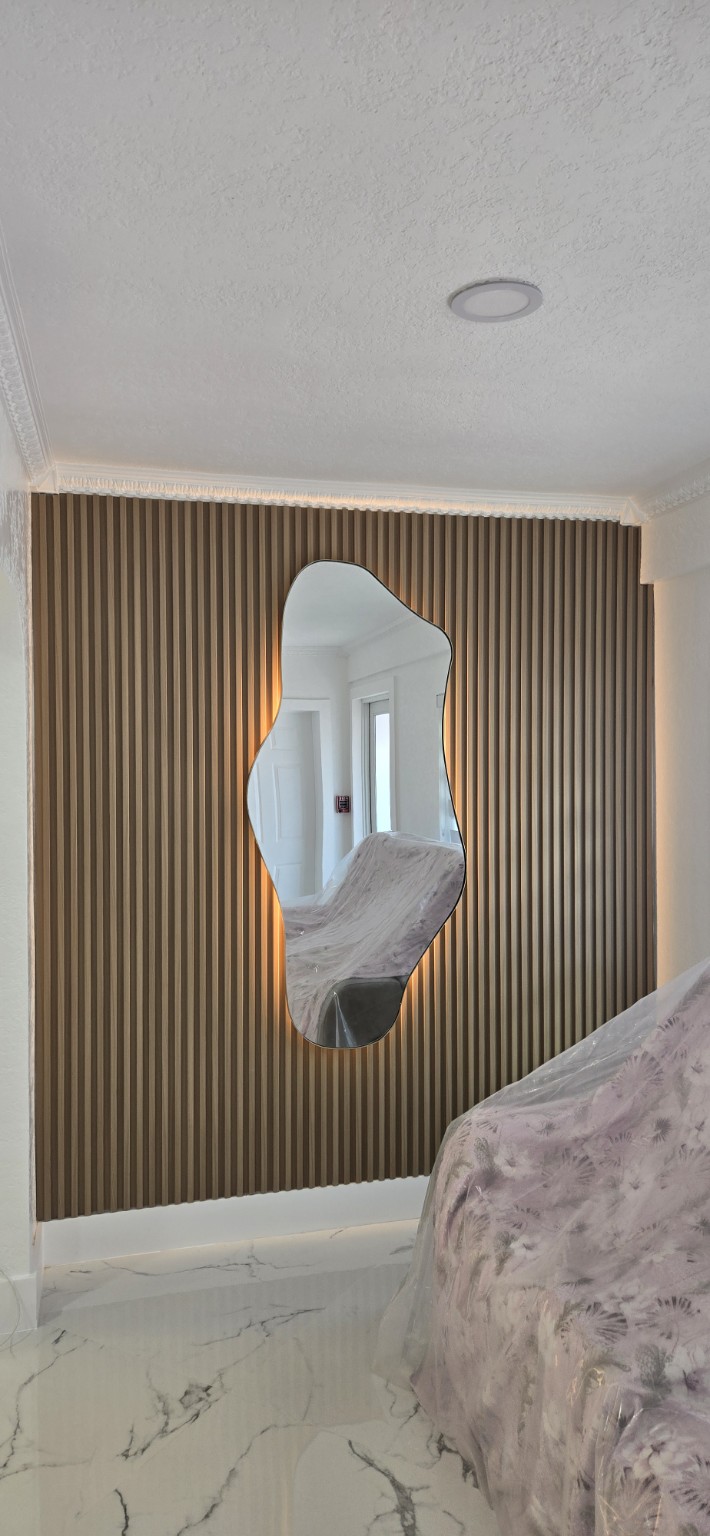 Decorative slat wall with mirror
